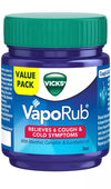 Vicks VapoRub jar with green lid on a white background
