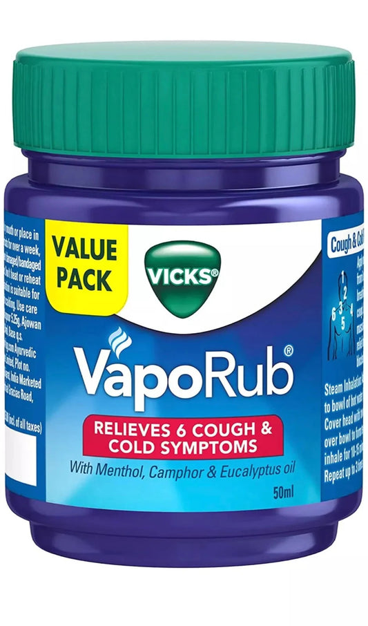 Vicks VapoRub jar with green lid on a white background