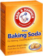 Box of Arm & Hammer baking soda with a bright orange color and brand logo.