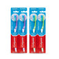 Four Colgate Extra Clean toothbrushes in medium hardness, packaged in their original blue and red retail blister packs against a white background.