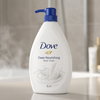 Dove Deep Nourishing body wash bottle with pump on a neutral background