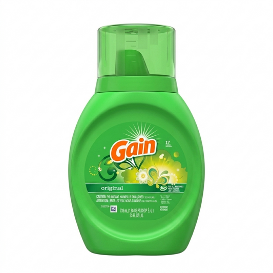 Green bottle of Gain laundry detergent on a white background
