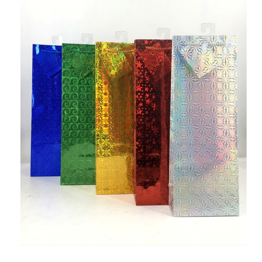 Five metallic gift bags with different patterns on a white background