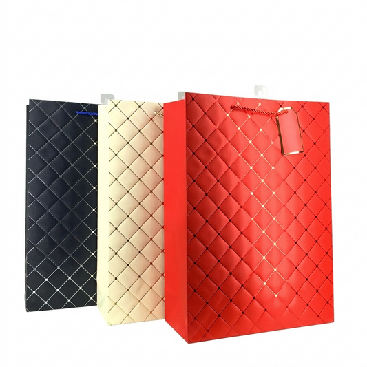 Three quilted paper bags in black, beige, and red on a white background