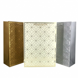 Three decorative gift bags with geometric patterns in gold, white, and silver on a white background.