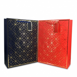 Two paper bags, one black and one red, with geometric patterns on a white background.