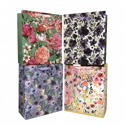 Four floral-patterned gift bags on a white background
