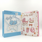 Two baby shower gift bags, one blue with elephant design and 'Baby Shower' text, the other pink with baby carriage and 'Baby Girl' text.