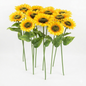 Bouquet of artificial sunflowers on a white background
