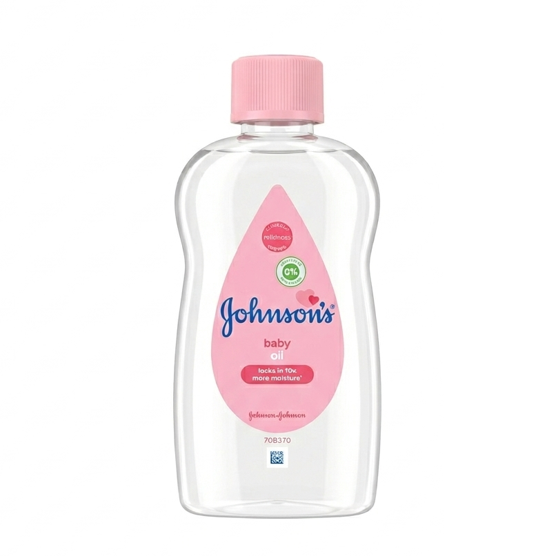 Johnson's baby oil bottle with pink cap on a white background