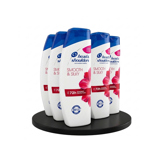 Head & Shoulders smooth & silky shampoo bottles on a black circular stand with a white background