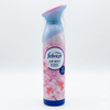 Febreze blossom and breeze air freshener spray bottle with cherry blossom design on a white background