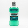 Bottle of Listerine Cool Mint mouthwash on a white background