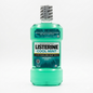 Bottle of Listerine Cool Mint mouthwash on a white background