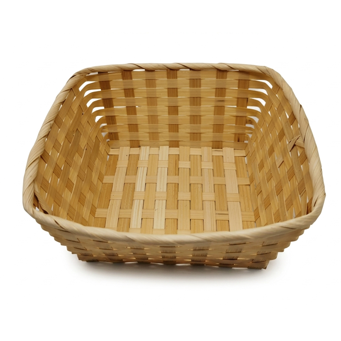 Woven wooden basket on a white background