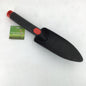 Black garden trowel with red handles on a white background