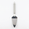 Metal cake server with a black handle on a white background