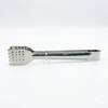 Metal tongs with perforated design on a white background