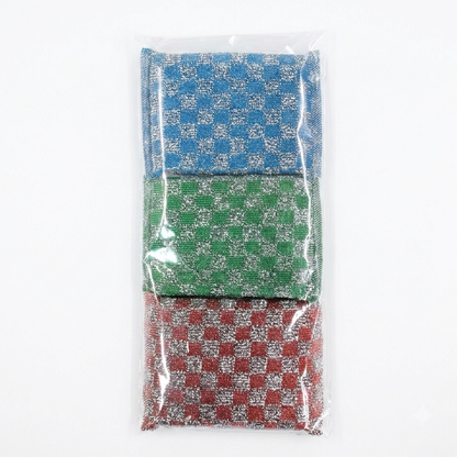 Three small woven fabric cleaning scrubs stacked vertically inside a clear plastic bag, each with a checkerboard pattern in blue, green, and red on a white background.