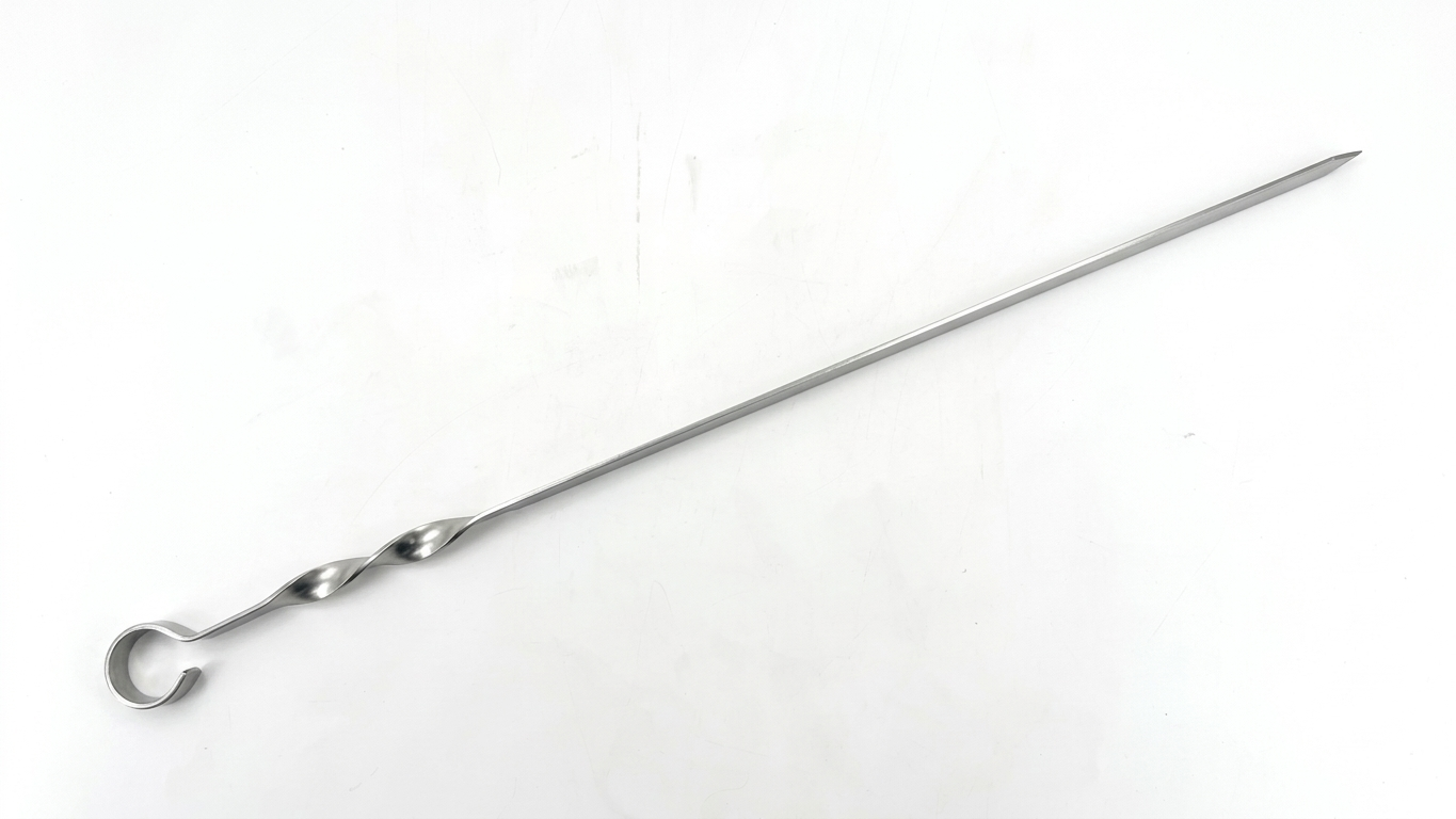 Metal skewer on a white background