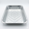 Aluminum foil food container on a white background