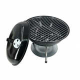 Black portable grill with a lid on a white background