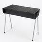 Black portable grill with metal legs on a white background