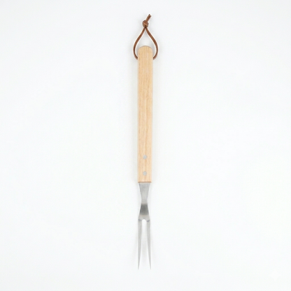 Barbecue fork with wooden handle on a white background