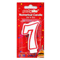 A white and red number 7 birthday candle in its original red 'partyrite' retail packaging, shown against a plain white background.