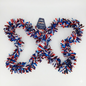 Red, white, and blue tinsel garland on a white background