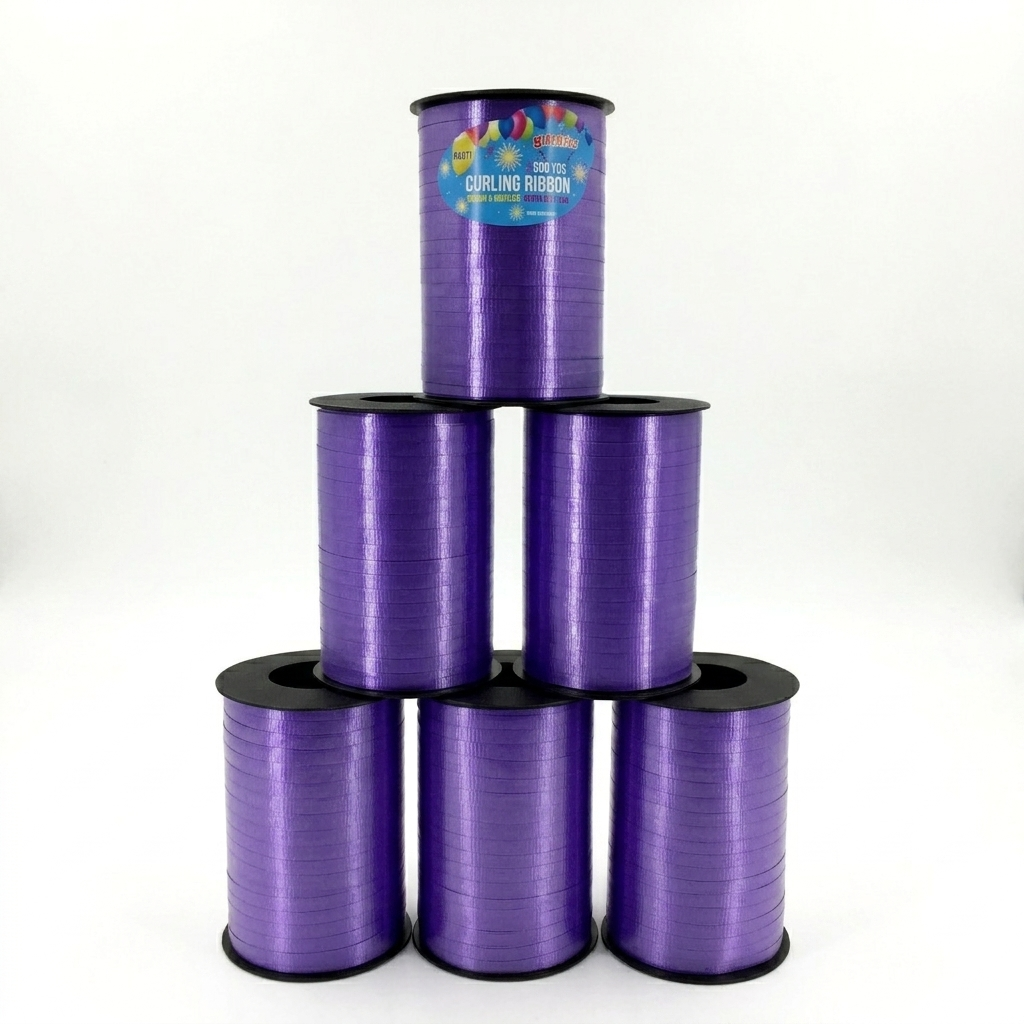 Purple curling ribbon spools stacked on a white background