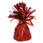 Red metallic balloon weight on a white background