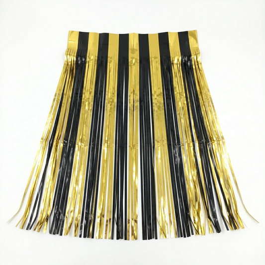 black and gold fringe skirt on a white background