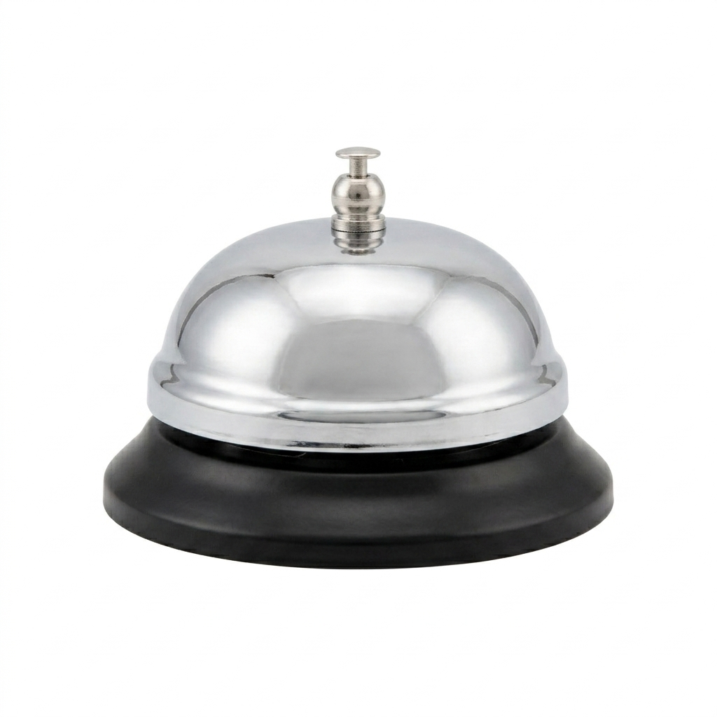 Metallic service bell with black base on a white background