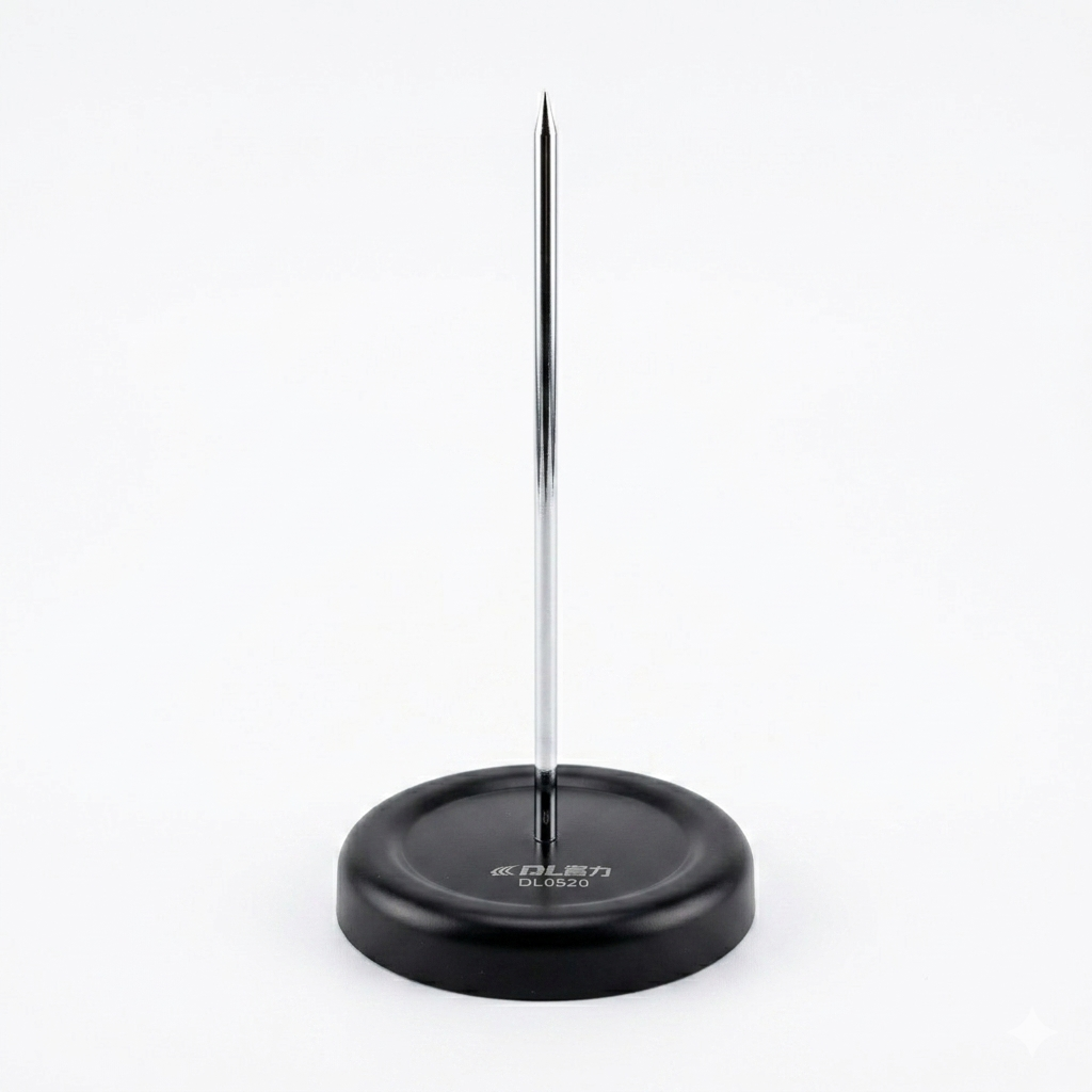 Black magnetic pin holder with a metal pin on a white background