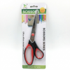 Scissors with red handles on a white background