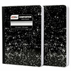 Two black composition notebooks with speckled pattern on a white background